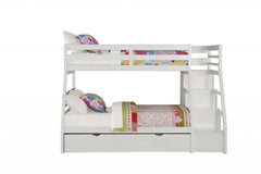 White twin over full solid wood bunk bed with stairs, trundle, and storage. Colorful bedding and pillows visible.