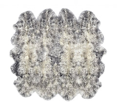Gradient Gray Animal Print Area Rug with a soft, textured surface in shades of gray and cream, featuring a unique wavy shape.