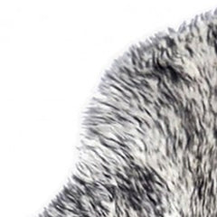 Gradient Gray Animal Print Area Rug featuring a soft, textured surface with a stylish animal print design in gray tones.