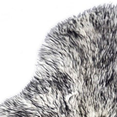 Gradient Gray Animal Print Area Rug featuring a soft, textured surface with a stylish animal print design in gray tones.