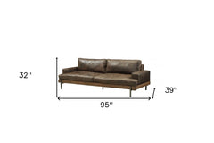95" Chocolate Top Grain Leather Sofa with black legs, featuring a modern design and plush cushions for comfort. Dimensions: 9
