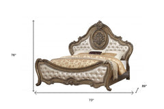 Queen Tufted Bronze Upholstered Faux Leather Bed with Nailhead Trim, featuring ornate design and plush upholstery. Dimensions