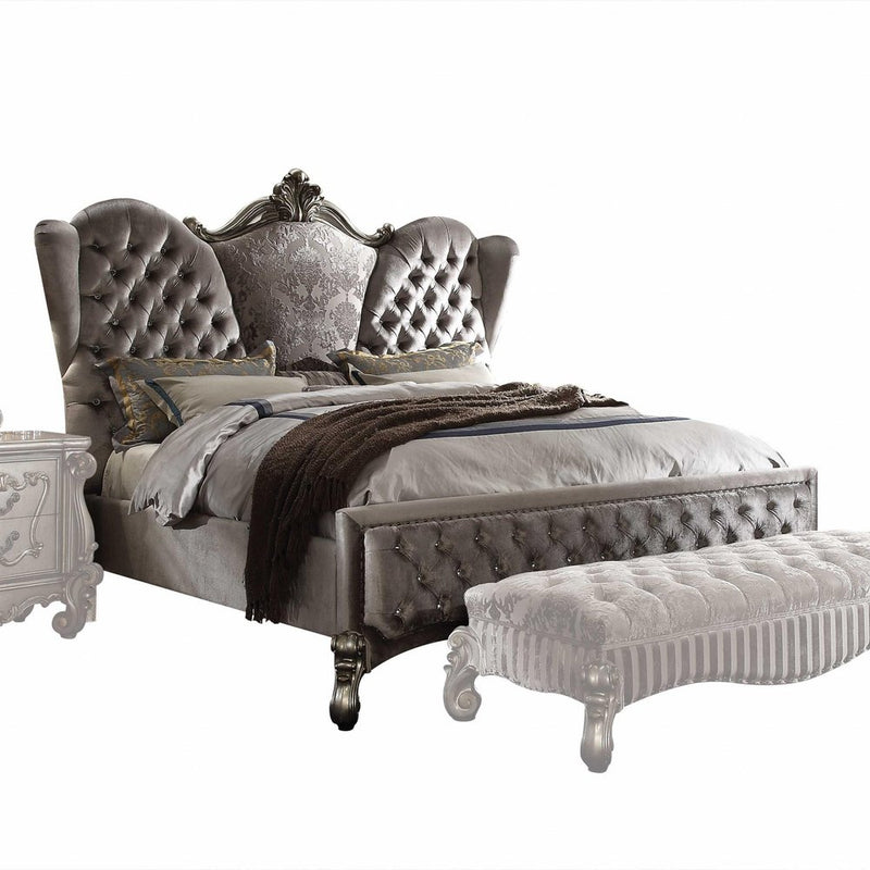 Velvet Antique Platinum California King Bed with tufted headboard and decorative footboard, featuring elegant upholstery and 