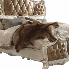 Pearl King Tufted Upholstered Faux Leather Bed Frame with Nailhead Trim featuring a luxurious design and plush bedding.
