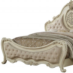 Antiqued white solid wood tufted upholstered linen bed frame with intricate detailing and a plush headboard.