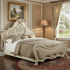 Antiqued white solid wood tufted upholstered linen bed frame with ornate headboard in a stylish bedroom setting.