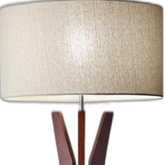 60" brown and white solid wood tripod floor lamp featuring a white fabric drum shade. Elegant and modern design for any room.