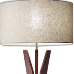 60" brown and white solid wood tripod floor lamp featuring a white fabric drum shade, ideal for modern decor.