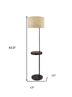 Beige and black tray table floor lamp with a beige fabric drum shade, measuring 63.5" tall and featuring a side table.