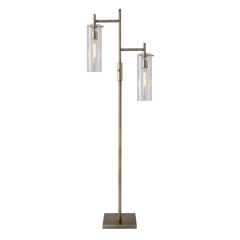 Brass metal floor lamp with two clear glass drum shades, featuring a sleek design and a square base.