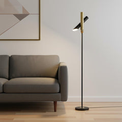 68" Black Metal LED Floor Lamp with a sleek black cylinder shade, positioned next to a modern gray sofa in a stylish interior