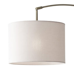 74" Brass Metal Arc Floor Lamp with Off White Linen Drum Shade, featuring a sleek design and soft, diffused lighting.