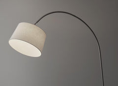 83" Silver Arc Floor Lamp with a white linen empire shade, featuring a sleek curved design and soft lighting.
