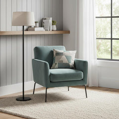 83" Silver Arc Floor Lamp with White Linen Empire Shade next to a teal armchair and decorative pillow in a bright room.