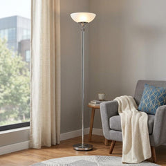 72" Silver Floor Lamp with White Glass Shade, featuring a sleek design next to a cozy gray sofa and warm decor.