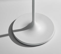 White floor lamp base with a smooth, round design, featuring a minimalist style for modern decor.