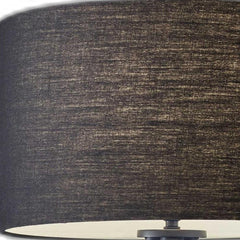 Black Metal Tripod Floor Lamp featuring a textured black fabric drum shade, designed for modern home decor.