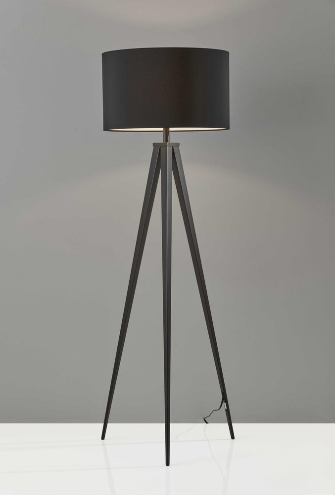 Black Metal Tripod Floor Lamp with a black fabric drum shade, featuring sleek legs and a modern design.