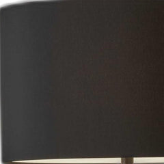 Black Metal Tripod Floor Lamp with a sleek black fabric drum shade, featuring a modern design and sturdy tripod base.