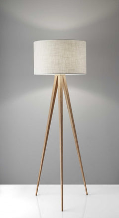 Black Metal Tripod Floor Lamp with a black fabric drum shade and wooden tripod legs, perfect for modern decor.