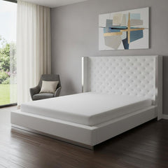 White tufted faux leather upholstered king bed frame with a sleek design, featuring a high headboard and minimalist style.