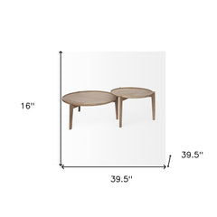 Set of two brown solid wood round nested coffee tables with a modern design, measuring 39.5 inches in diameter and 16 inches 
