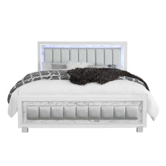 White solid wood and faux leather lighted king bed frame with a tufted headboard and modern design. Cozy bedding and throw in