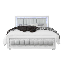 White solid wood and faux leather lighted king bed frame with a tufted headboard and decorative accents.