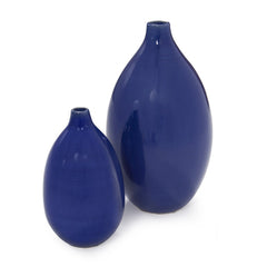 Set of two cobalt ceramic round table vases in varying sizes, featuring a smooth, glossy finish and ribbed texture.