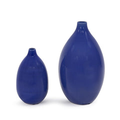 Set of two cobalt ceramic round table vases in varying sizes, featuring a smooth, glossy finish and ribbed texture.