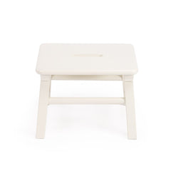 Solid wood step stool angled view highlighting sturdy construction and clean white painted finish