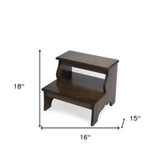 Wooden step stool positioned in kitchen to reach upper cabinets – 15-inch height boost