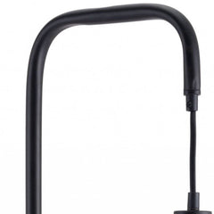 Black and white steel LED floor lamp with a sleek, modern design, featuring a curved black arm and a round base.