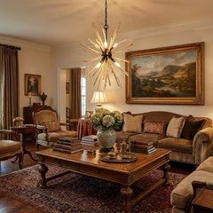 Wood and Metal Starburst Six Bulb Hanging Light illuminating a cozy living room with vintage decor and a wooden coffee table.