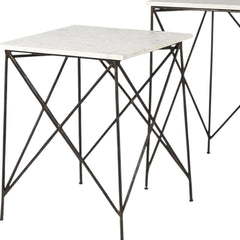 Set of two square nested tables featuring white and black marble tops with metal geometric bases. Stylish and modern design.