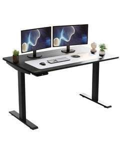 Adjustable Black Stainless Steel Rolling Computer Desk with dual monitors, keyboard, and decorative plants.