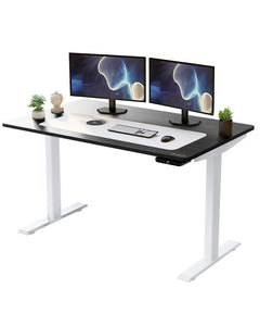 Adjustable black and white wood and stainless steel rolling computer desk with dual monitors, keyboard, and decorative plants