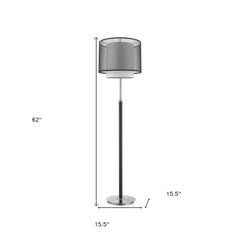 62" floor lamp with a black and white fabric drum shade, featuring a sleek design and a round base. Dimensions: 62" height, 1