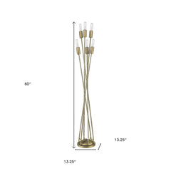 60" Six Light Torchiere Floor Lamp with a sleek design, featuring six bulbs on slender, curved arms and a round base.