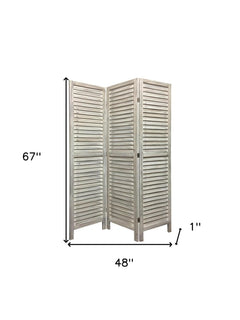 67" white solid wood folding three-panel screen room divider with a slatted design, measuring 48" wide and 1" thick.