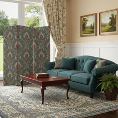 72" Green Folding Three Panel Screen Room Divider with intricate design, placed near a teal sofa and coffee table in a cozy r