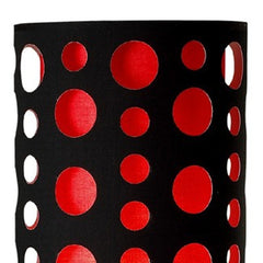 Black and red drum shade of a 66" steel novelty floor lamp featuring circular cutouts. Modern design with vibrant colors.