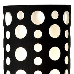 66" Steel Novelty Floor Lamp with a black and red drum shade featuring circular cutouts for a modern design.