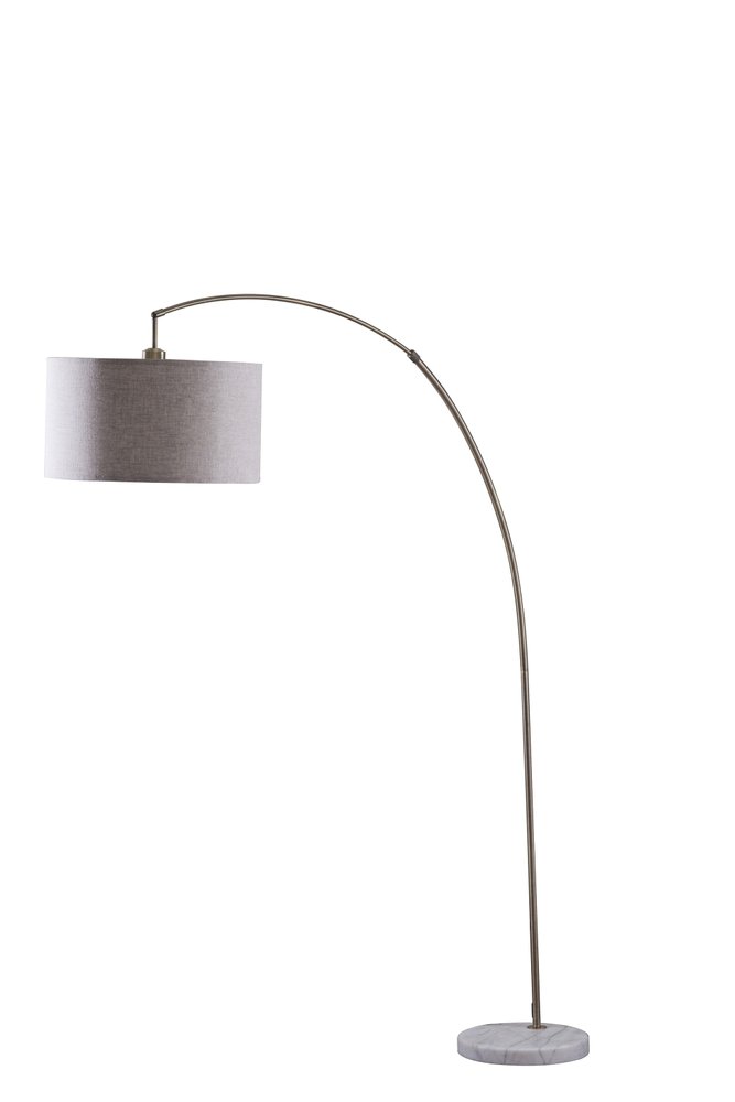 Antique gold arched floor lamp with a marble base and gray fabric drum shade.