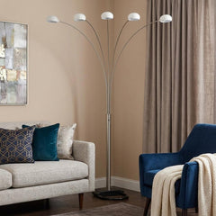 84" White Five Light Arc Floor Lamp with White Dome Shade, featuring a sleek design and multiple light sources in a cozy livi