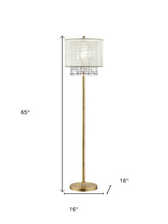 65" gold and white novelty floor lamp with a white fabric drum shade and crystal accents, featuring a sleek design.