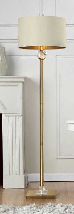 63" Gold Column Floor Lamp with Off White Metal Drum Shade featuring a sleek design and crystal accent on a sturdy base.