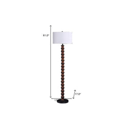 61" brown and white resin floor lamp with a white fabric drum shade, featuring a textured base and a sleek design.