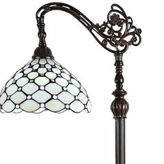 62" brown and white metal floor lamp featuring an ornate design and a white glass bowl shade. Elegant and stylish lighting op