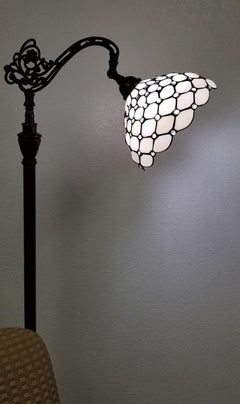 62" brown and white metal floor lamp featuring a white glass bowl shade with a decorative design. Ideal for stylish lighting.